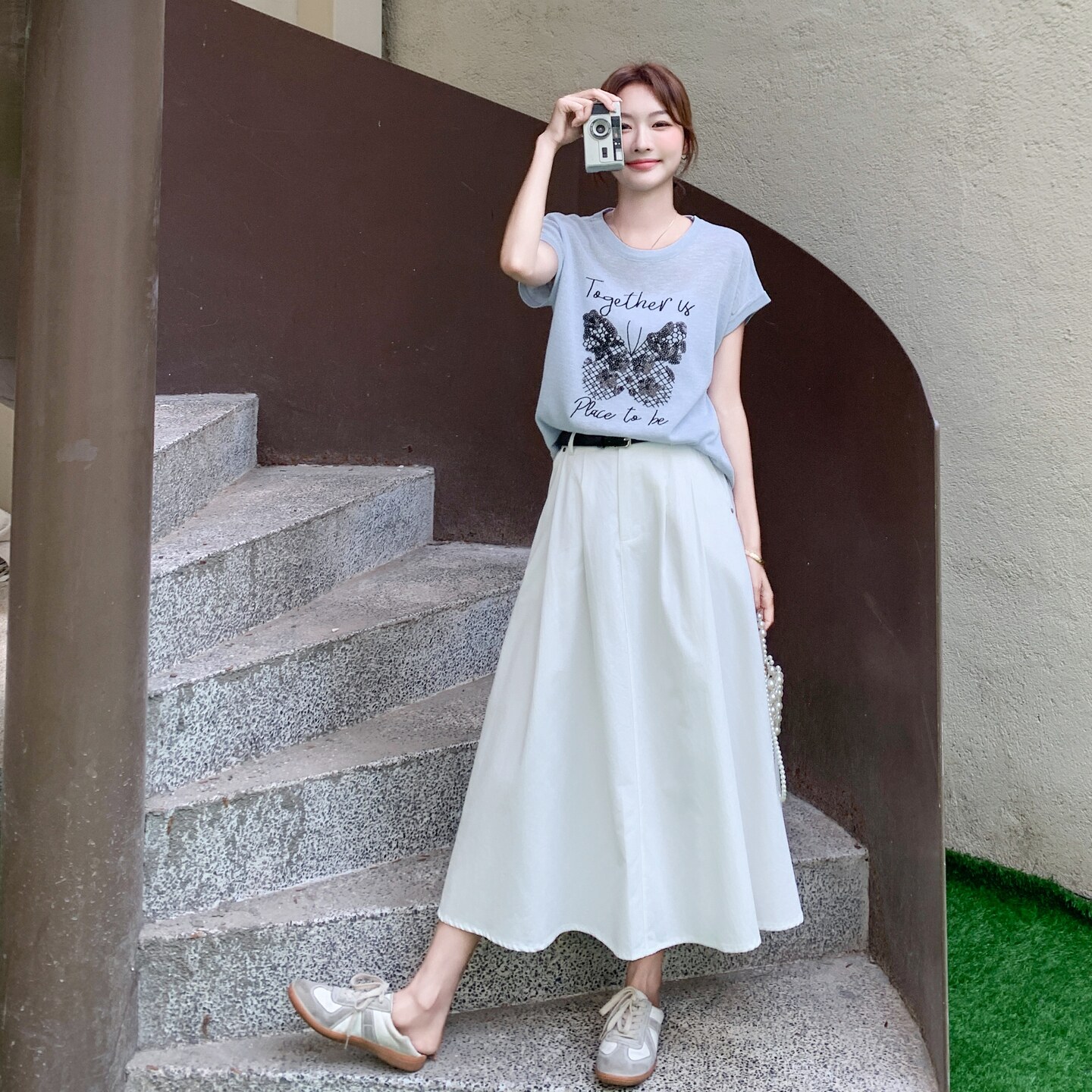 韩里韩气穿搭套装女2025夏季新款设计感休闲印花短袖半身裙两件套图片