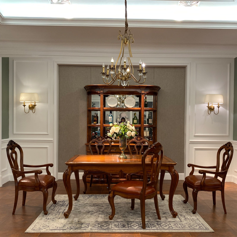 A table of four chairs at a table in Huazh