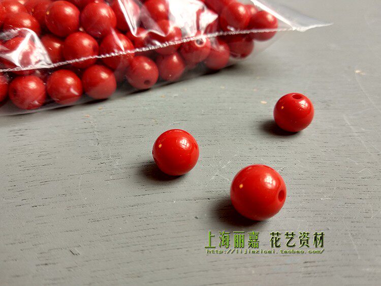 A small bag of red beads
