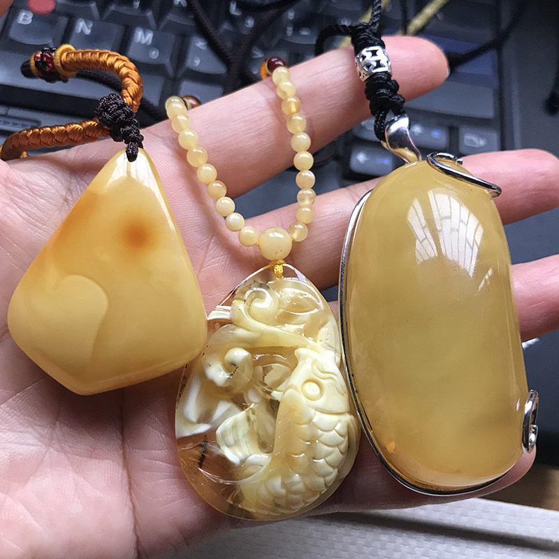 蜜蜡吊坠纯天然原石原料人工打磨琥珀挂件925银包边