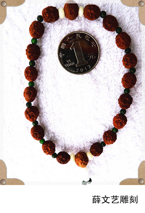 Xue Wenyi sculpted hand carved jujube core 18 Luhan 0 8 cm jujube nucleus olive bamboo root carvings