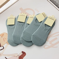 Светло -зеленая пара носков для лодок, чтобы поднять рисунок