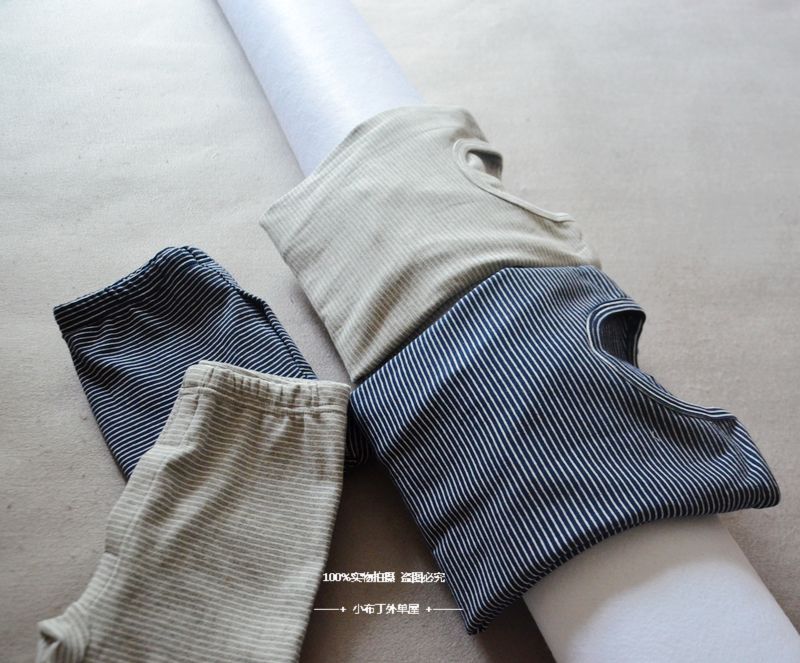 18 mùa thu mới nam và nữ cotton bốn mặt căng dịch vụ nhà mùa thu quần áo mùa thu cha mẹ trẻ em bộ 110-170 thời trang trẻ em cao cấp