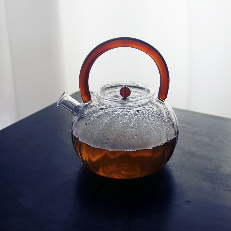 Japan-style heat resistant glass jug Tie-beam boiling teapot boiling water boiling kettle braces strainer threaded pot Minfire black crystal furnace heating