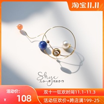 Planet instrument three-in-one grass female 2021 New Tide temperament fun Mori advanced sense retro single autumn and winter earrings