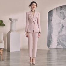 Three year old store for women in suits, with over 20 colors available. Suit sets in pink, professional dress, and women's suits with a design sense that is niche. Double breasted, small broadcaster, host, and professional dress