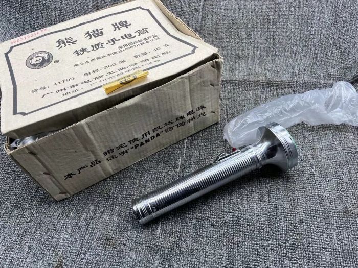 Old goods 10 years ago stock panda old flashlight national picture and vision nostalgia lighting iron retro flashlight