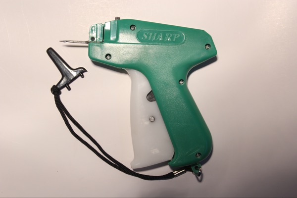 Sharp brand trademark tag bullet gun shot by children