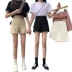Quần short nữ mùa hè Phiên bản cao của Hàn Quốc là quần lửng bó sát và phóng khoáng retro Hồng Kông nếm quần lưới rộng chân đỏ quần ống rộng - Quần short
