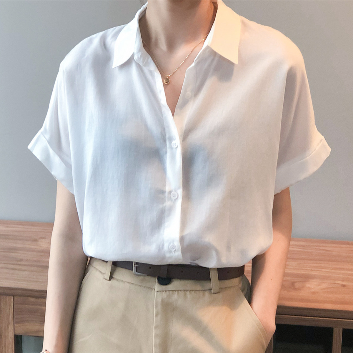 Tencel short-sleeved shirt female slim casual temperament 2023 summer new Korean version retro solid color loose top