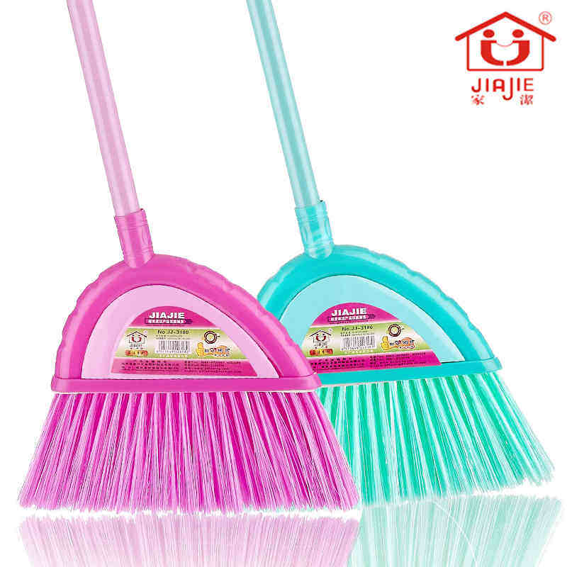 The home cleaning sweeps the plastic soft hair and the broom lengthen the