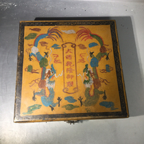 A set of cat-eye handles inside a Qianlong imperial lacquer box