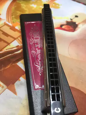 Cool brother steel gun fixed version of the hole sound 24-hole polyphonic harmonica non-Swan Tongbao small pirate Oriental light Qimei