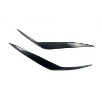 Suitable for 03-06 modern cool carbon fiber modified eyebrow headlight eyebrow decorative stickers angry eye eyebrow lamp eyebrow stickers