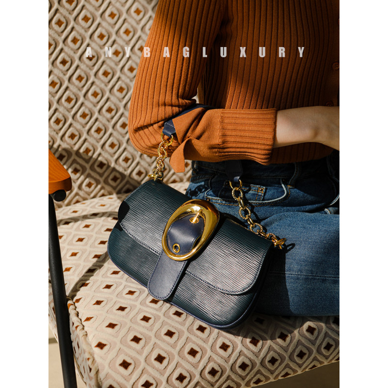 C-bit aura! Presence is full! Water ripple cowhide! Irregular gold clasp armpit handbag