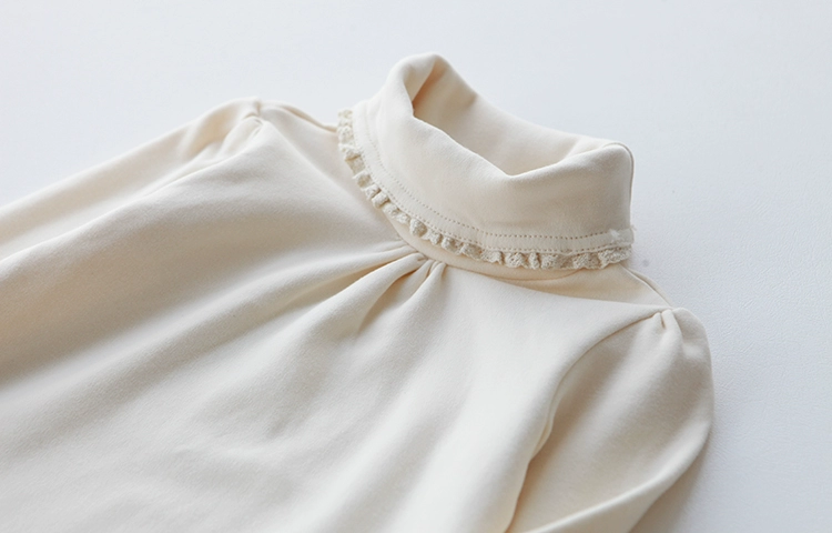 Áo thun nữ dáng lửng nữ mùa thu 2018 cotton hoang dã dài tay ren áo sơ mi màu bé gái cổ cao