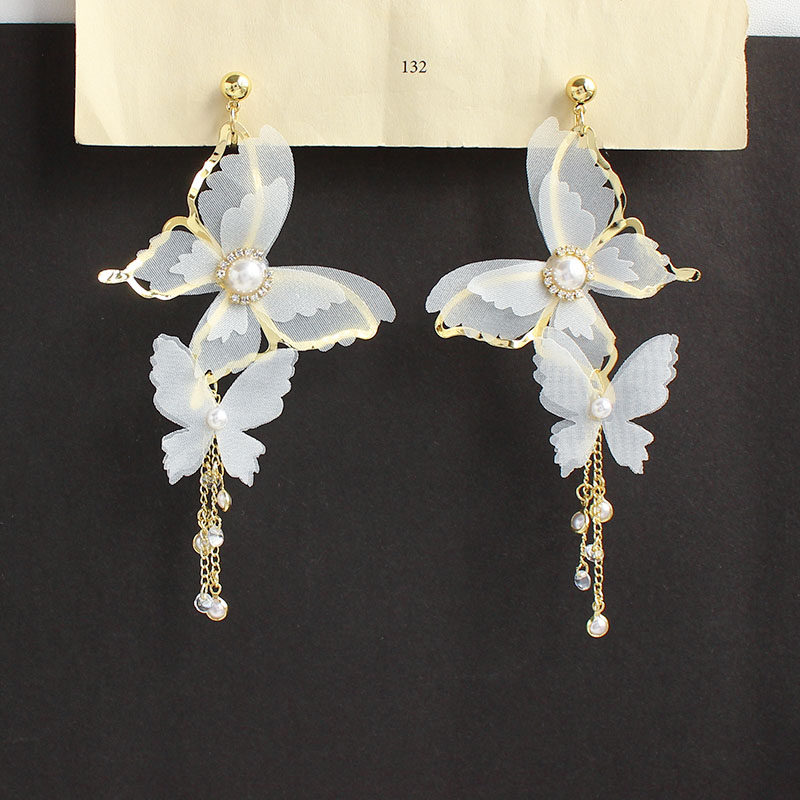 High level Sensation Light Extravaganza Design White Super Fairy Butterfly Fluo earrings South Korean temperament Exaggerated Ear Clip Earrings
