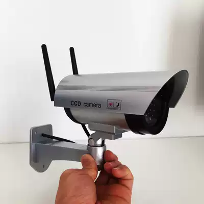 Simulation camera fake monitoring model demolition with antenna with light flash rainproof camera model to see the orchard