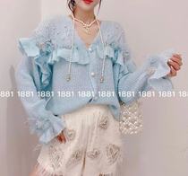 Knitted cardiovert woman autumn new Korean version sweet and artificial nail pearl solid flower foreign air 100 lap sweaters jacket blouses