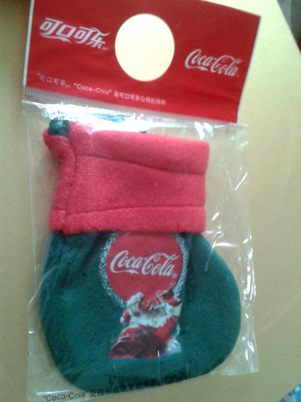 The Coca-Cola Christmas Sox little suede bag.