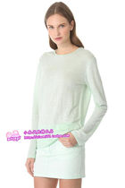 Sun protection in a mint green long sleeve loose collar T-shirt