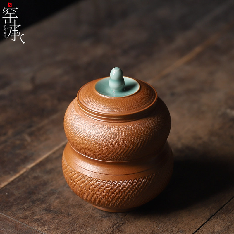 Longquan celadon Zhang Haochun hand-jumping knife tea pot Ceramic tea sealing pot storage tank Tea ceremony zero accessories