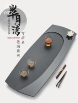 The natural whole piece of black gold stone tea tray for home use in the modern simple size Japanese tea table kung fu tea tray
