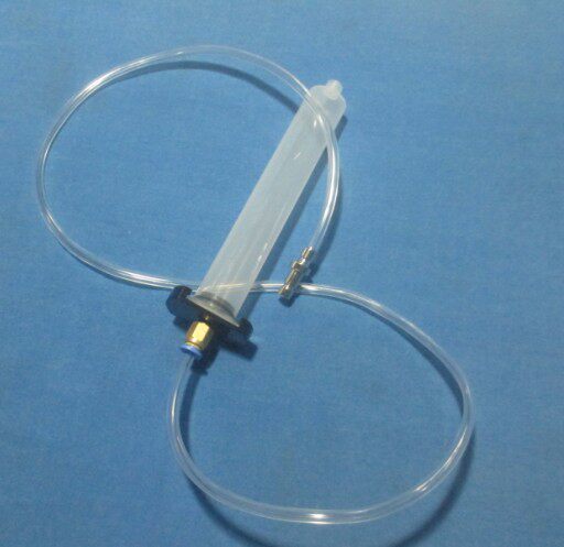 Aluminium alloy adapter for stainless steel point rubber syringe connector