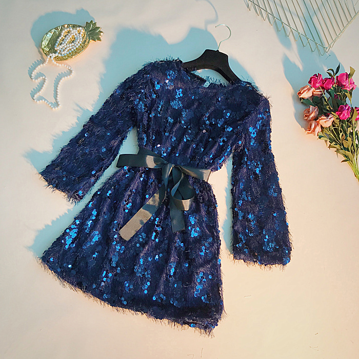 2018 mùa thu mới Hàn Quốc phiên bản của phụ nữ tính khí eo vòng cổ lông tua sequins dài tay váy váy phụ nữ váy trắng trễ vai