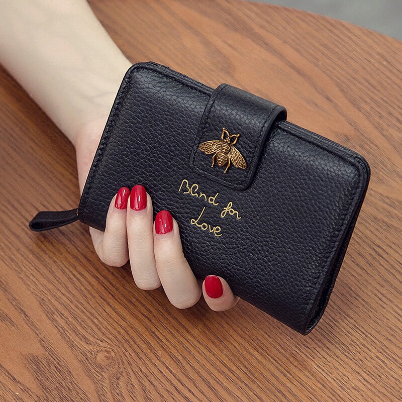 2021 new leather short wallet women's tri-fold women's wallet Korean version trendy folding mini cowhide small wallet