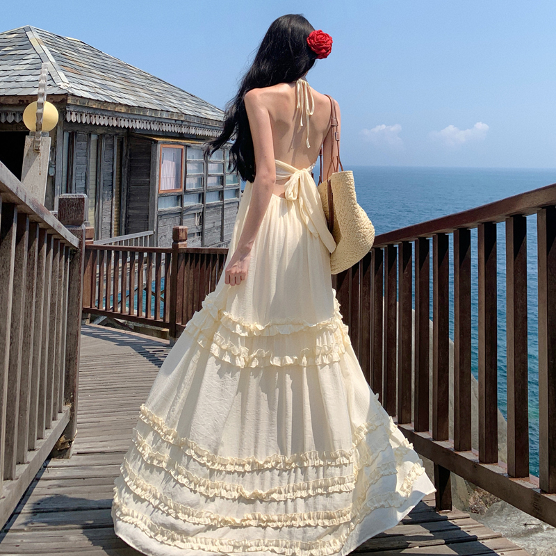 Thai Pure and Sexy Vacation Style Halter Neck Spaghetti Strap Dress for Women with Ruffled Edges, Backless, Tie-Up, Long Dress for Beach Photoshoots Thai Pure and Sexy Vacation Style Halter Neck Spaghetti Strap Dress for Women with Ruffled Edges, Backless, Tie-Up, Long Dress for Beach Photoshoots