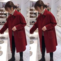 European horn buckle double-sided cashmere coat womens long loose doll collar double-sided high-end woolen coat