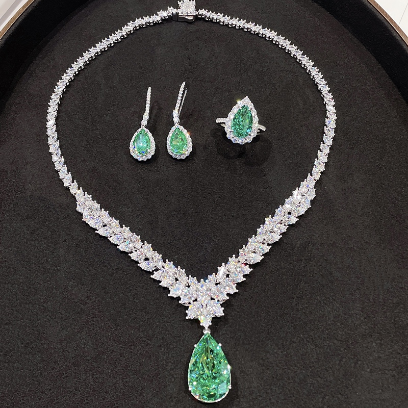 Cumee Elegant Goddess Style Fashion Jewelry Set with Water Drop Synthetic Paraiba Color High Carbon Diamond, Silver Plated with Gold