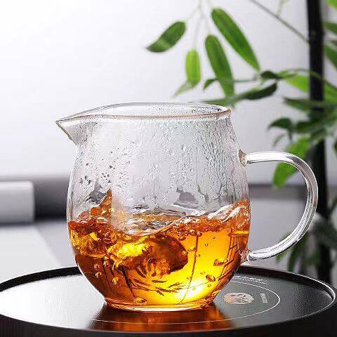 Thickened high temperature resistant glass fair cup manual tea divider tea cup home filtered tea sea leakage kung fu tea set