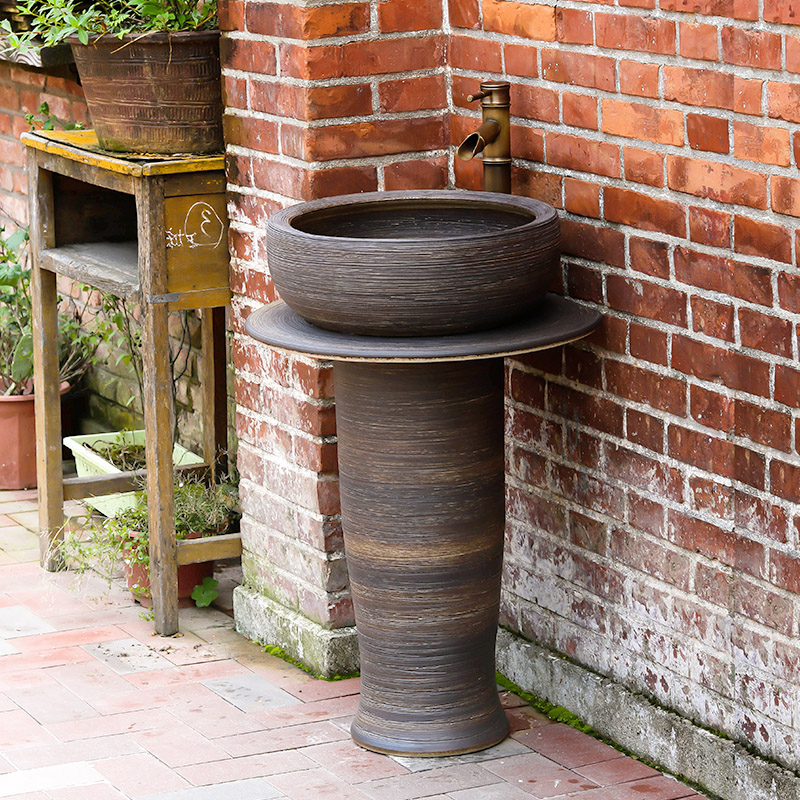 Vertical to the sink basin of pillar type column ceramic bathroom toilet is suing balcony ground the pool that wash a face basin