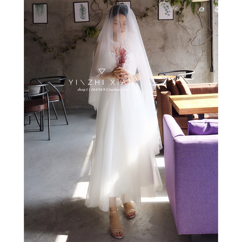 Light wedding dress 2022 new Mori super fairy simple and thin dream travel shoot out gauze dress suspender dress spring
