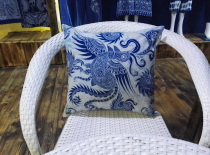 Wax dyeing and holding back cushions leaning on pillows to make processed batik dye T-shirts Custom Miao Wax Dyeing Ethnic Customs Experience