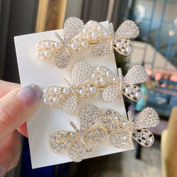 Rhinestone pearl bow hair clip ອິນເຕີເນັດສະເຫຼີມສະຫຼອງ super shiny hair clip bangs clip side clip hair accessories women 2022 new style