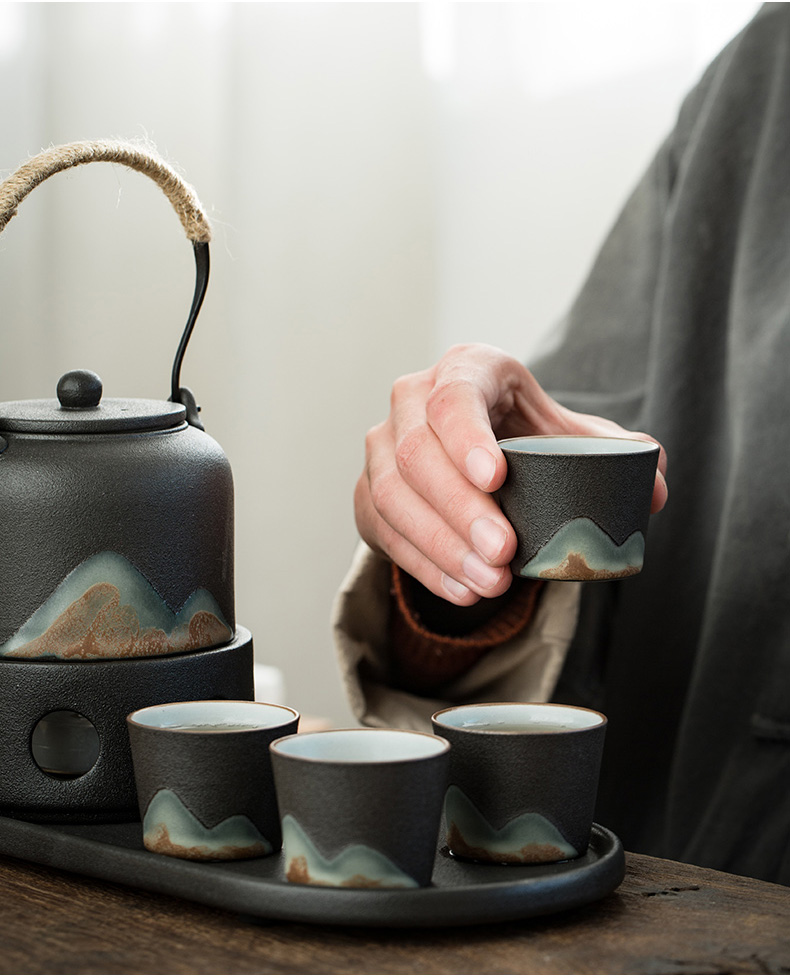 Japanese coarse pottery kung fu tea set tea pot of warm tea mountains to girder device heating base glass ceramic tea tray