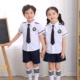 Quần áo mùa hè cotton quần áo mẫu giáo đồng phục tiểu học phục vụ mùa hè phù hợp với phong cách Anh quần áo tốt nghiệp ngắn tay để chụp ảnh - Đồng phục trường học / tùy chỉnh thực hiện đồng phục dành cho học sinh tiểu học và trung học