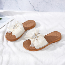 Sandslippers 2022 New female outwear Non-slip genuine leather Butterfly knot Bull Fascia Bottom Slippers Seaside Soft Bottom Beach Shoes