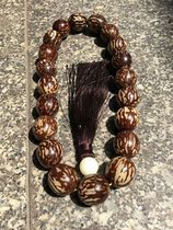 About 25 Bodhi root flower husk hand string holding Buddha beads and rosary a picture