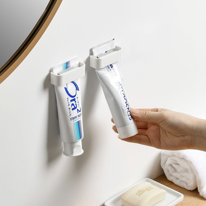 Toothpaste shelf wall mounted punch-free toothpaste toilet washing clamper bathroom bathroom wall