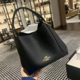 Шанхай Кангканг искренний магазин скидок. Специальные предложения по рекомендации Little Red Book Новая кожаная большая пакет батареи.