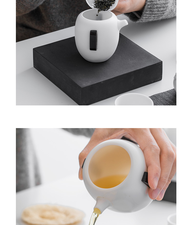 And creation of dehua white porcelain tea tea set suit household contracted hand grasp pot teapot is a complete set of tea cups