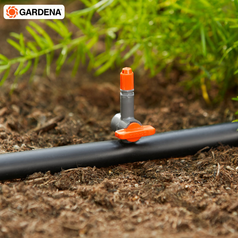 German GARDENA Cardiner with 1374 drop head control valve to adjust the flow rate and the spraying range