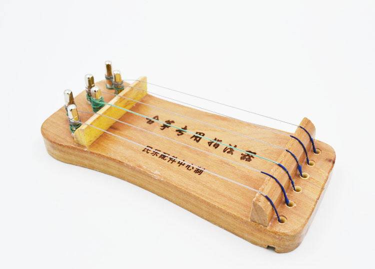 Guzheng special fingering instrument wholesale small guzheng portable solid wood guzheng fingering device manufacturers direct sales wholesale