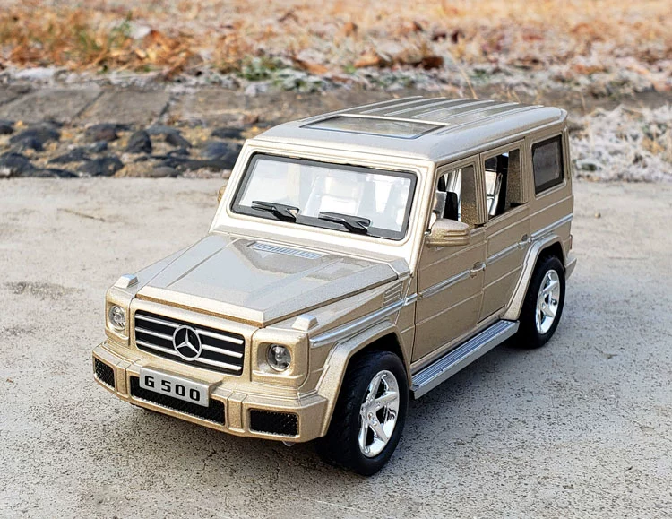 1:32 Mercedes-Benz G500 off-road suv mô hình xe hợp kim mô phỏng mô hình xe ô tô kim loại trang trí âm thanh và ánh sáng kéo lại đồ chơi - Trang trí nội thất