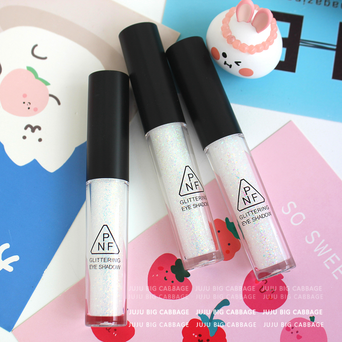 There is diamond liquid eye shadow over the eye ~ unicorn crystal diamond pearlescent big bright sheet tears eye makeup