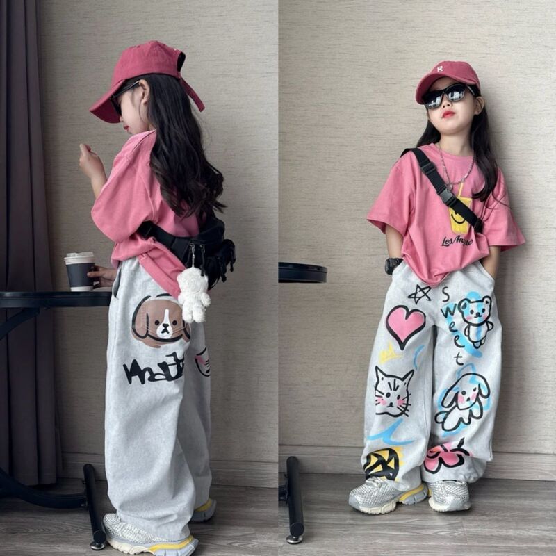 Girls' Summer Trendy Outfits 2025, Long Graffiti Jeans for Older Children, Children's Casual Short-Sleeved Shirt Two-Piece Set Girls' Summer Trendy Outfits 2025, Long Graffiti Jeans for Older Children, Children's Casual Short-Sleeved Shirt Two-Piece Set